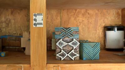 Wood blocks bearing different printing patterns are stored at the studio. Finbar Anderson / The National