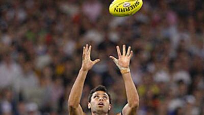 Setanta O'Hailpin of the Blues catches the ball during their 120-64 win over Richmond in Melbourne yesterday.