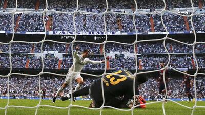 Real Madrid's Cristiano Ronaldo celebrates after converting a penalty kick against Barcelona in their 'El Clasico' victory on Saturday at the Santiago Bernabeu. Juan Medina / Reuters