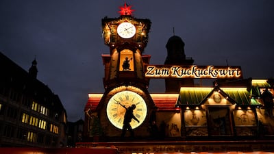Employees install Christmas decorations in central Frankfurt. AFP