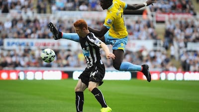 Yannick Bolasie of Crystal Palace and Jack Colback of Newcastle United compete for the ball during their Premier League match on Saturday, which ended in a 3-3 draw. Tony Marshall / Getty Images
