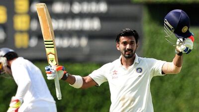 India's Lokesh Rahul celebrates after reaching his century on Thursday on Day 1 of the second Test against Sri Lanka in Colombo. Lakruwan Wanniarachchi / AFP / August 20, 2015