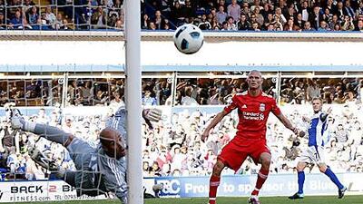 Pepe Reina pulls off another stunning save to keep Birmingham City at bay as Liverpool left St Andrew's with a point yesterday.