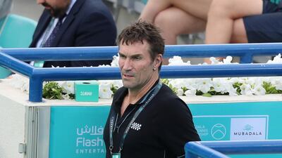 Pat Cash watches the match between Stefanos Tsitsipas and Andrey Rublev at Zayed Sports City in Abu Dhabi. Chris Whiteoak / The National