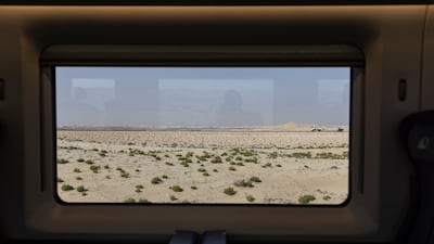 A view from an Etihad Rail passenger train as it travels through Abu Dhabi