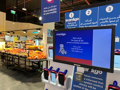 An error message appears at a Carrefour point of sale in Dubai International Airport. The National