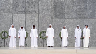 Right to Left - Sheikh Saud bin Rashid Al Mu'alla, UAE Supreme Council Member and Ruler of Umm Al Quwain, Sheikh Hamad bin Mohamed Al Sharqi, UAE Supreme Council Member and Ruler of Fujairah, Sheikh Humaid bin Rashid Al Nuaimi, UAE Supreme Council Member and Ruler of Ajman, Sheikh Mohamed bin Zayed, Crown Prince of Abu Dhabi and Deputy Supreme Commander of the UAE Armed Forces, Sheikh Mohamed bin Rashid, Vice-President, Prime Minister of the UAE, Ruler of Dubai and Minister of Defence, Dr Sheikh Sultan bin Mohamed Al Qasimi, UAE Supreme Council Member and Ruler of Sharjah and Sheikh Saud bin Saqr Al Qasimi, UAE Supreme Council Member and Ruler of Ras Al Khaimah, observe a moment of silence during a Commemoration Day ceremony at Wahat Al Karama.