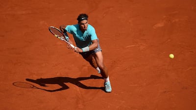 Rafael Nadal of Spain returns a shot during his men's singles match against Leonardo Mayer of Argentina on day seven of the French Open at Roland Garros on May 31, 2014 in Paris, France. Matthias Hangst/Getty Images