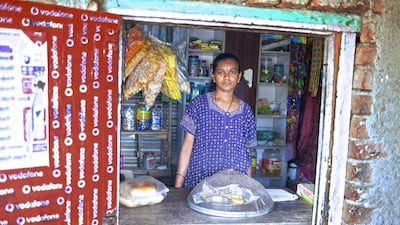 Urmila Vedga runs a small snack stall from the window of her house to augment family income.