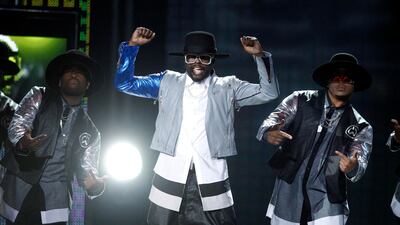Will.i.am, centre, performs during the Billboard Music Awards at the MGM Grand Garden Arena in Las Vegas. Steve Marcus / Reuters