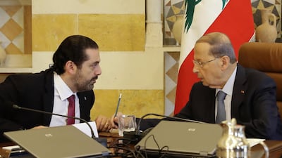 Lebanese President Michel Aoun, right, and Prime Minister-designate Saad Hariri at the presidential palace. AFP