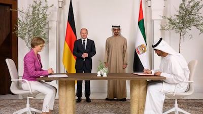 Sheikh Mohamed and Mr Scholz, witness the signing of a New Energy Security and Industry Accelerator agreement, by Dr Sultan Al Jaber, Minister of Industry and Advanced Technology Group, and Dr Franziska Brantner, Parliamentary State Secretary for Economic Affairs and Climate of Germany, at Al Shati Palace. Photo: UAE Presidential Court