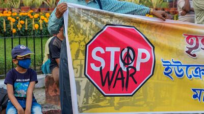 Protesters gathered in in Kolkata, India, on March 7 demanding Russia should stop its war in Ukraine. AP