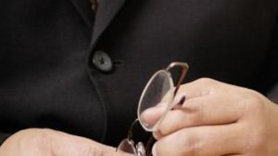 A man is not ready for work until he dons a suit jacket or blazer.