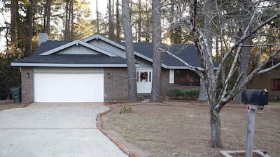 The home where a 13-year-old boy who reportedly has been missing for four years, was located by police when they found a false wall in a closet in the house in Jonesboro, Georgia. Tami Chappell / Reuters