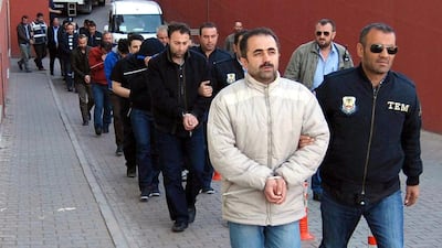 Members of the Turkish police escort suspects of the Gulen movement during nationwide operations in Kayseri city, Turkey, on April 26, 2017. Turkey conducted raids across the country, one of the largest operations in months, arresting over 1,000 people suspected of being connected to the movement loyal to US-based Islamic cleric Fethullah Gulen who has been blamed for the failed coup in July 2016. Olcay Duzgun/EPA