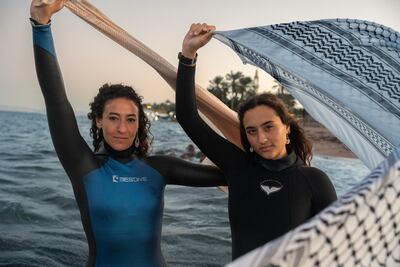 Ramadan and Albitar, seen here holding a Palestinian keffiyeh, say their involvement in the sport encourages other Arab women. Jack Lawes for The National