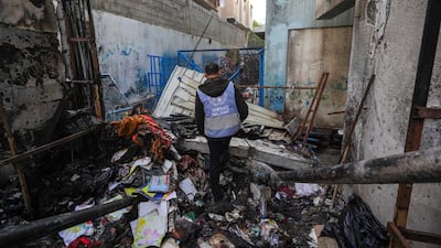 An UNRWA worker in a school destroyed during the war in Gaza. AFP