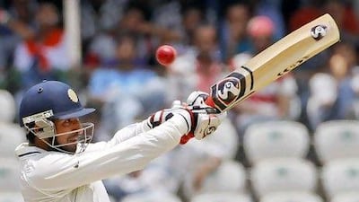 India's Cheteshwar Pujara hit a century against New Zealand in Hyderabad.