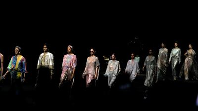 Models present creations by Tarun Tahiliani during the Fashion Design Council of India Lakme Fashion Week in Mumbai. AP Photo
