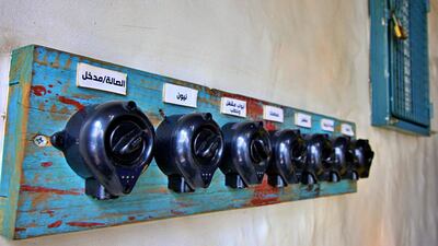 Little touches like these retro light switches and a planter filled with flowers provide splashes of colour. Courtesy Charlie Faulkner