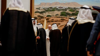 The pontiff meets Bahraini officials after arriving in the country for a four-day visit. AP