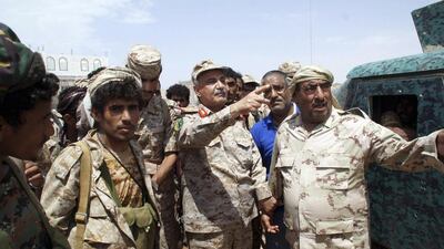 Yemen’s defence minister, Major General Mohammed Nasser Ahmed, second right, visits Shabwa province on May 4, 2014, as the army presses an offensive against Al Qaeda-linked militants. Yemen Defence Ministry via Reuters