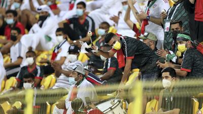 Expectant UAE fans in celebratory mood prior to the match. Chris Whiteoak / The National