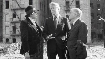 Jimmy Carter, centre; Abe Beame, New York mayor, right; and housing official Patricia Harris discuss the Bronx. AP Photo / Harvey Georges
