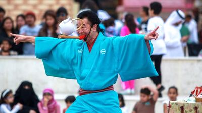 Senmaru of Japan does his tea cup balancing act trick. Victor Besa for The National