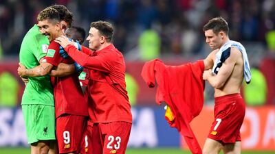 Liverpool players enjoy winning the Club World Cup semi final. EPA