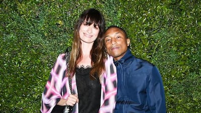 Caroline de Maigret, the event’s host and face of Chanel’s Gabrielle bag, wore a printed silk embroidered coat and blklhôhçyuçhack lace top from Chanel’s spring/summer 2017 ready-to-wear collection, along with the new Gabrielle bag and Chanel shoes. Co-host Pharrell Williams wore a navy silk jacket and pants from the autumn/winter 2017-18 ready-to-wear collection. Courtesy Chanel. Courtesy Chanel