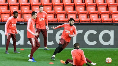 Luis Suarez and Barcelona teammates take part in training at Anfield ahead of the Uefa Champions League semi-final, second leg against Liverpool. AP Photo