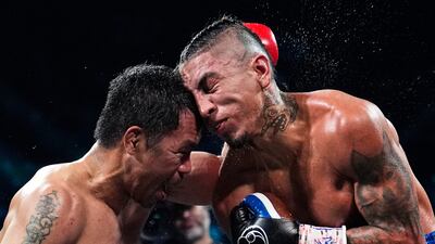 Manny Pacquiao, left, fights Mario Barrios in a WBC welterweight championship title fight in Las Vegas, Nevada on July 19. It ended in a draw and Pacquiao is asking for a re-match. AP