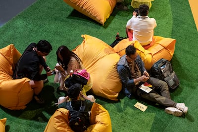 The mood among visitors was upbeat at Binance Blockchain Week in Dubai on Wednesday, despite a price decline in the wider crypto industry. Antonie Robertson / The National