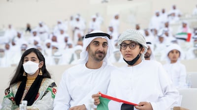 Sheikh Tahnoon bin Mohamed, Sheikh Hamdan bin Mohamed, and Sheikha Fatima bint Mohamed attend the Union Parade during the Sheikh Zayed Heritage Festival. Hamad Al Kaabi / Presidential Court