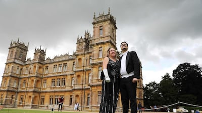 Visitors attend a 1920s themed event at Highclere Castle, near Newbury, west of London, on September 7, 2019, ahead of the world premiere of the Downton Abbey film. AFP