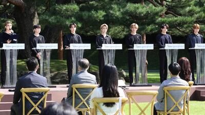 South Korean K-Pop group BTS attend a ceremony marking the National Youth Day at the presidential Blue House in Seoul, South Korea, Saturday, Sept. 19, 2020. Yonhap via AP