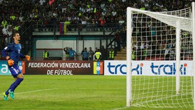 Venezuela goalkeeper Daniel Hernandez watches the ball nestle in the back of the net from Gabriel Jesus’s shot. Marco Bello / Reuters