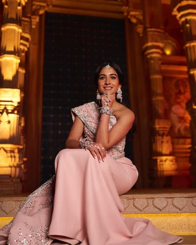 Radhika Merchant in a sari-style dress by Ashi Studio for her pre-wedding party in India. Ashi Studio / Instagram