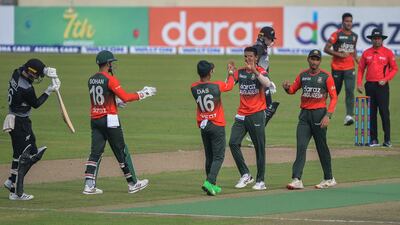 Bangladesh celebrate after the wicket of Tom Blundell at the Sher-e-Bangla National Stadium. AFP