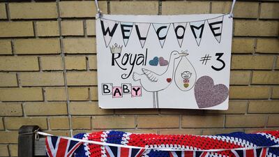 Royal well-wishers hung a sign outside the Lindo Wing of St. Mary's hospital in London, Britain, 23 April 2018. (EPA/ANDY RAIN)