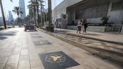 4. K-pop boyband Exo's Dubai Star is seen on the sidewalk of Sheikh Mohammed bin Rashid Boulevard, Dubai. Leslie Pableo / The National
