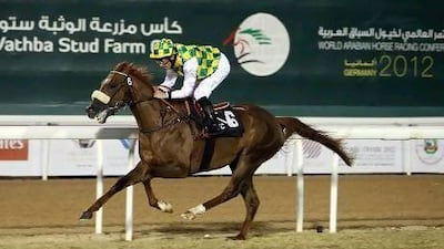 Wayne Smith and Naseem raced to the front on the final bend in the UAE Arabian Derby.