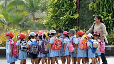 Pre-school children go on an outing in Singapore. AFP