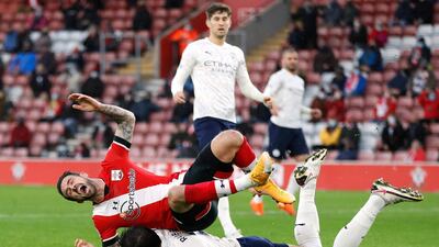 Southampton's Danny Ings in action with Manchester City's Ruben Dias. Reuters
