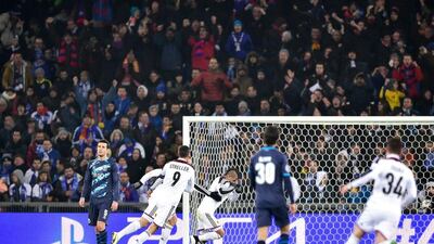 Derlis Gonzalez, centre, wheels away after handing Basel the lead early in the first-half. Michael Buholzer / AFP