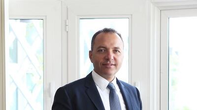 Abdallah Massaad, the chief executive of RAK Ceramics, says that his company is sttractive to investors because of its diversified client base – it sells to more than 160 different countries. Pawan Singh / The National