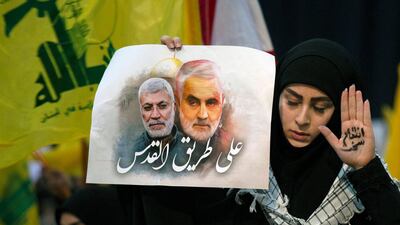 A supporter of Hezbollah leader Sayyed Hassan Nasrallah wears the words "powerful revenge" on her hand, ahead of the leader's televised speech in a southern suburb of Beirut, Lebanon. AP Photo