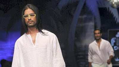 The designer extended his beachy aesthetic to his menswear collections. Getty Images